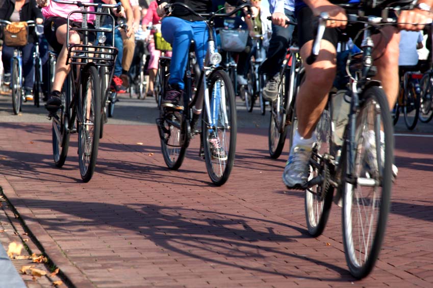 bicyclists and bike bollards