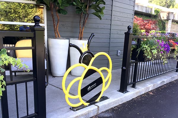 Commercial Bike Racks In The Shape Of A Bee Reinforce The Brand And Create "Buzz"