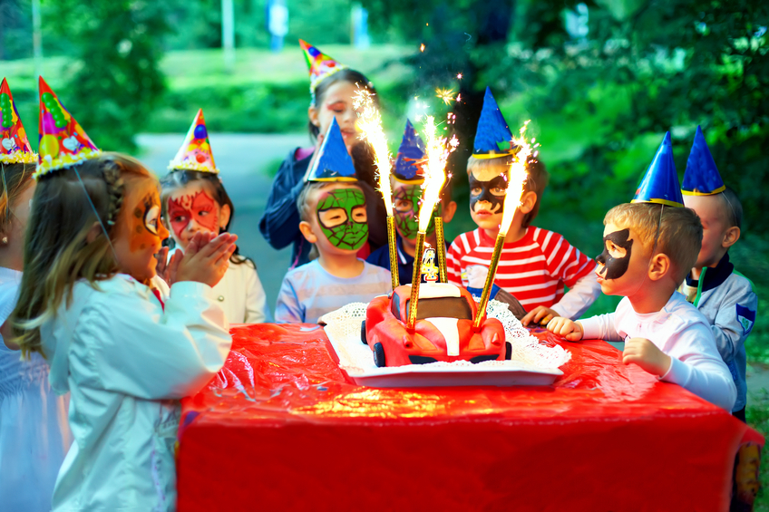 happy kids gather around a picnic table