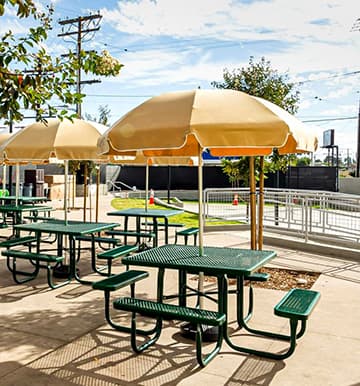 Commercial Umbrellas Chosen For Charter School For Durability, Appeal And Sturdiness