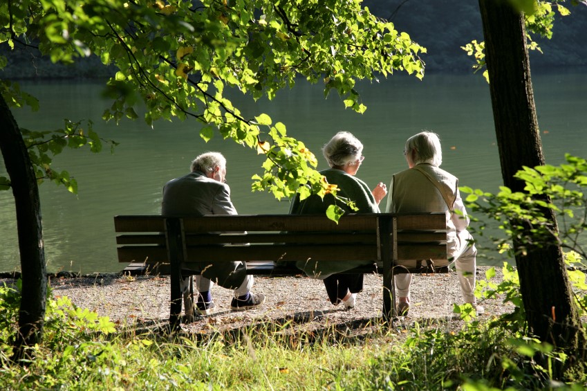 park benches overlooking a pond