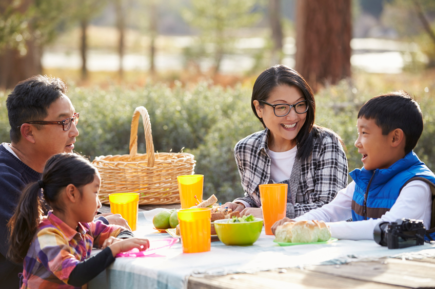 family at a picnic table
