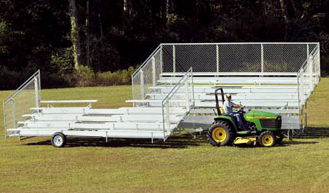 aluminum bleachers towed by lawn tractor
