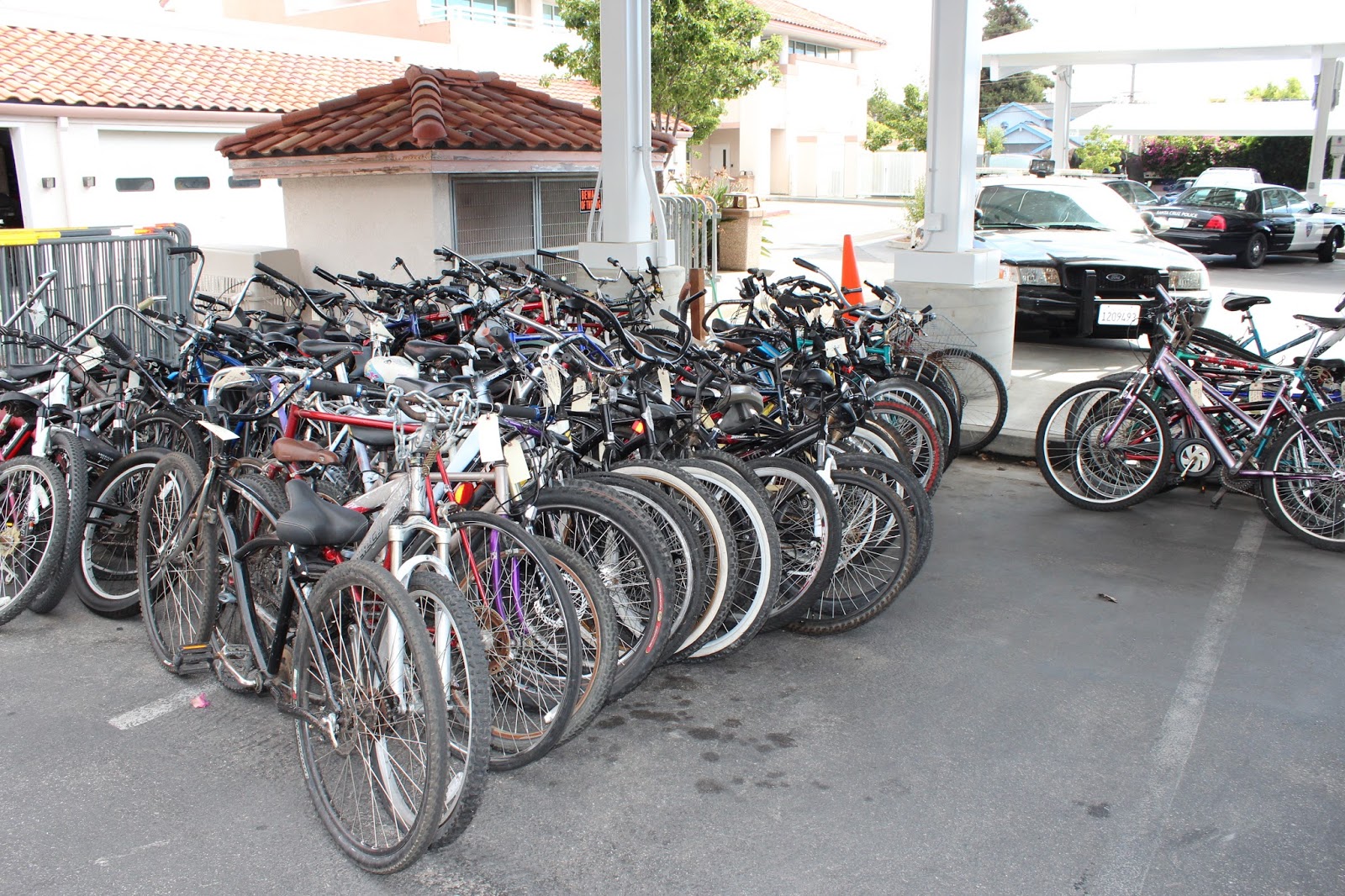 Commercial Bike Racks Needed to Replace "Sucker Poles" and Prevent Bike Thefts