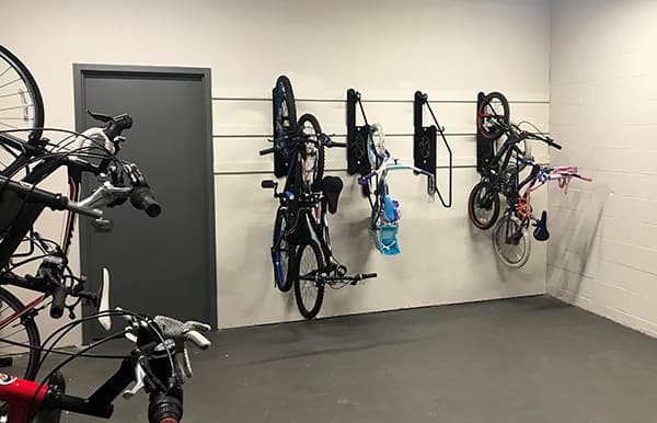 Wall-Mounted Bike Racks And Repair Stations Create Appealing Bike Rooms In Luxury Apartments